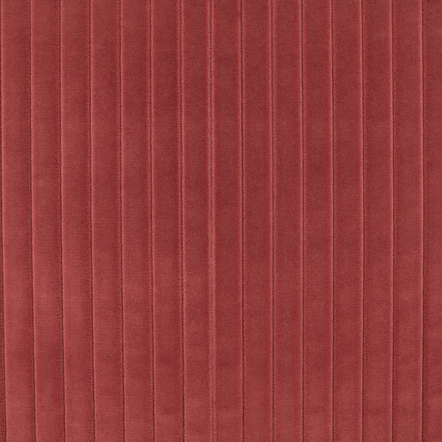 Warm paprika-red ribbed fabric with narrow vertical channels and subtle pile shading