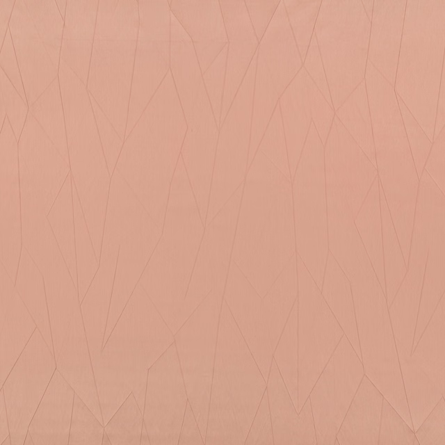 Muted clay-peach textile with fine, angular tonal lines across a flat surface