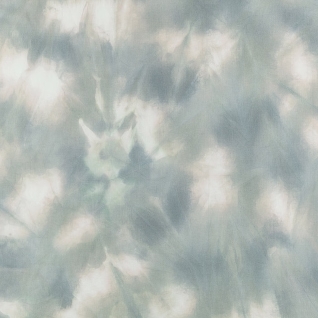 Misty aquamarine fabric with soft cream clouds and blurred blue-green painterly shading