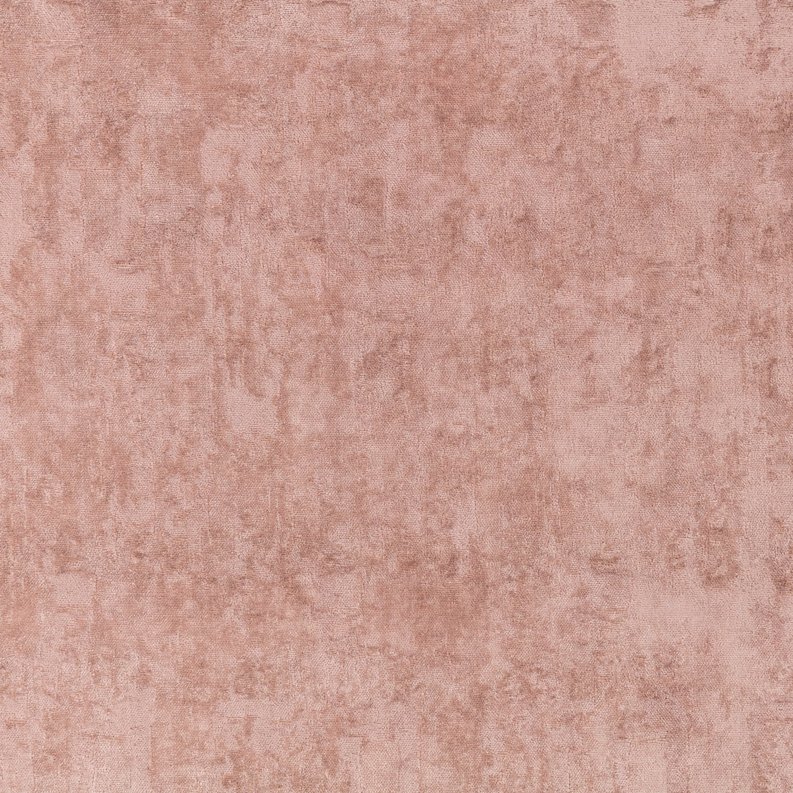 Dusty blush pink fabric with softly mottled, painterly tonal texture
