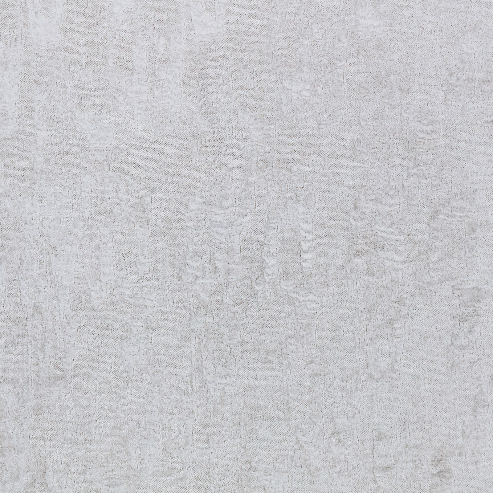 Pale cool-grey fabric with fine mottled, weathered vertical texture