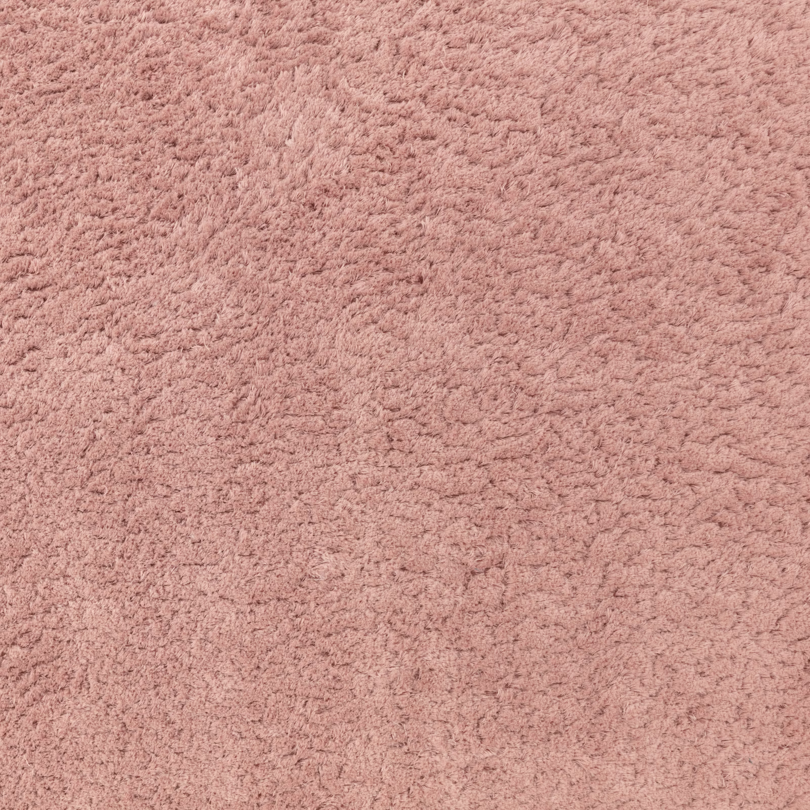 Close-up of muted vintage rose fabric with dense, softly ridged pile