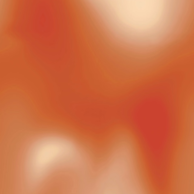 Blurred sunset-orange textile with warm cream highlights and red-toned colour fields