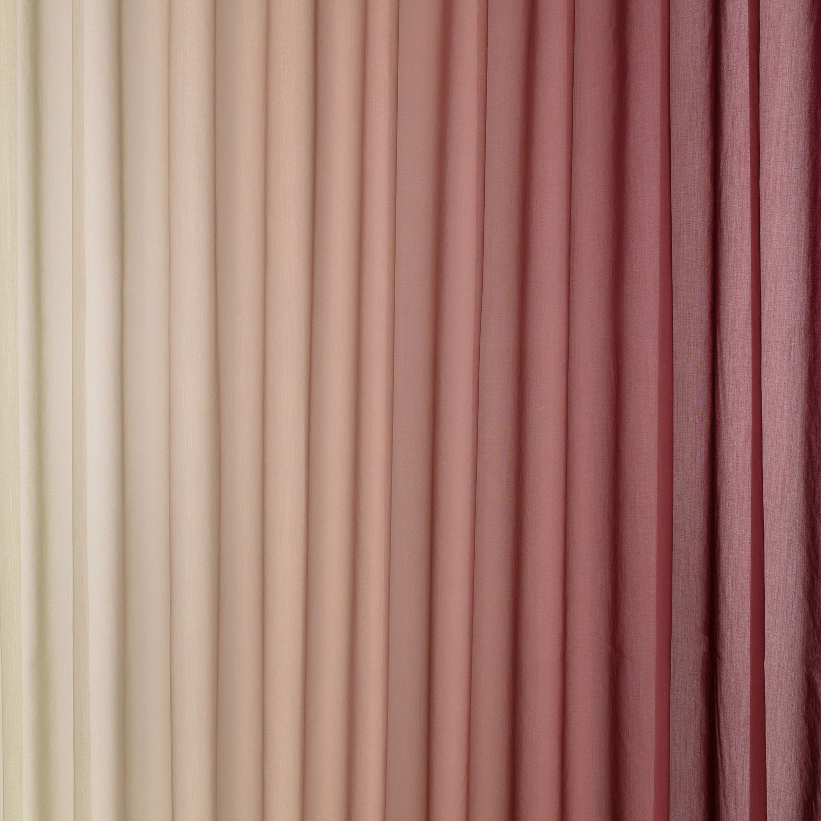 Muted radicchio fabric with vertical ribbing shifting from cream to burgundy