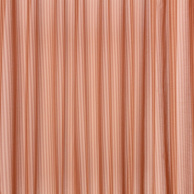 Dusty pink textile with fine vertical peach and coral stripes