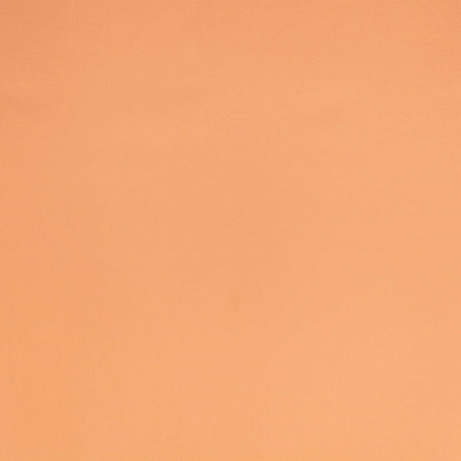 Warm amber-orange plain fabric swatch with subtle woven texture and tonal shading