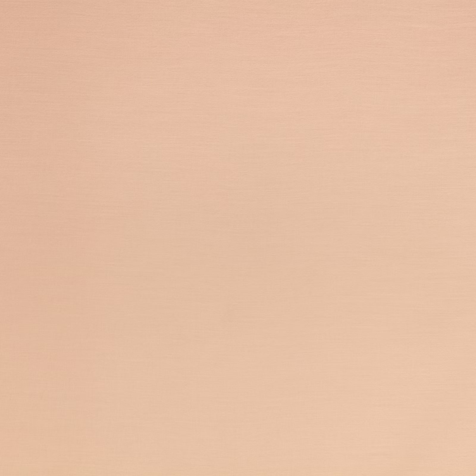 Soft peach-pink plain-weave fabric with a fine horizontal surface texture