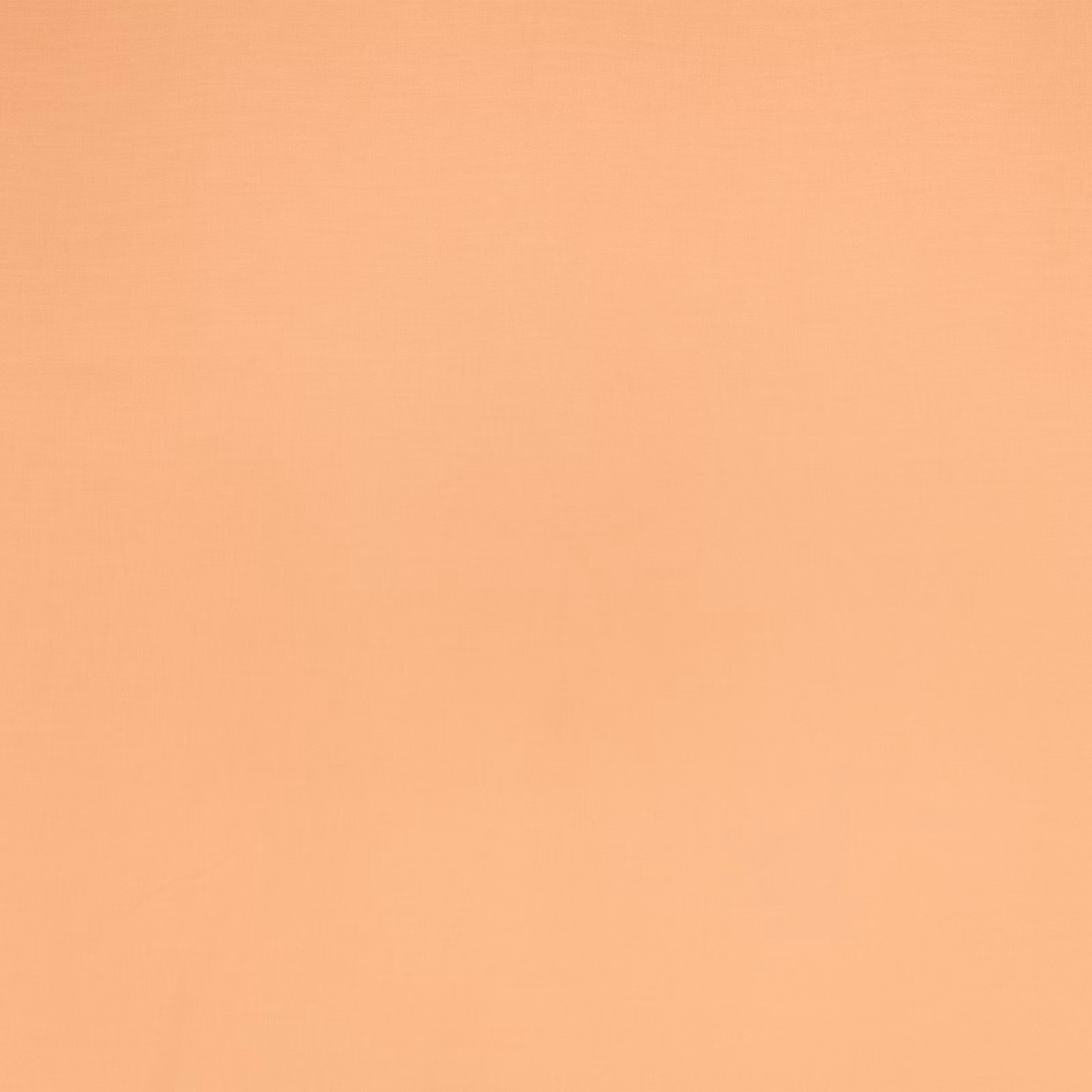 Even dusty pink woven fabric with a soft peach undertone and subtle texture