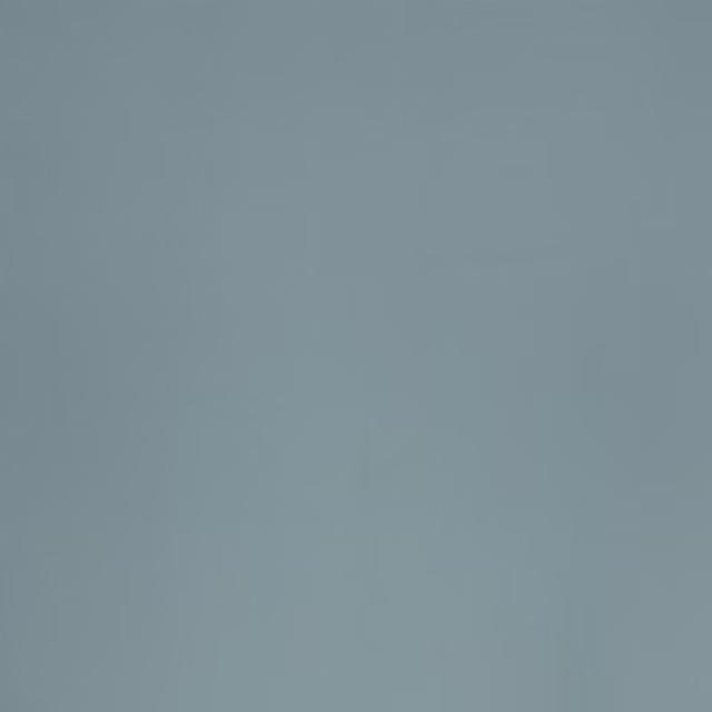 Muted blue-grey plain fabric swatch with a softly mottled, even textile surface
