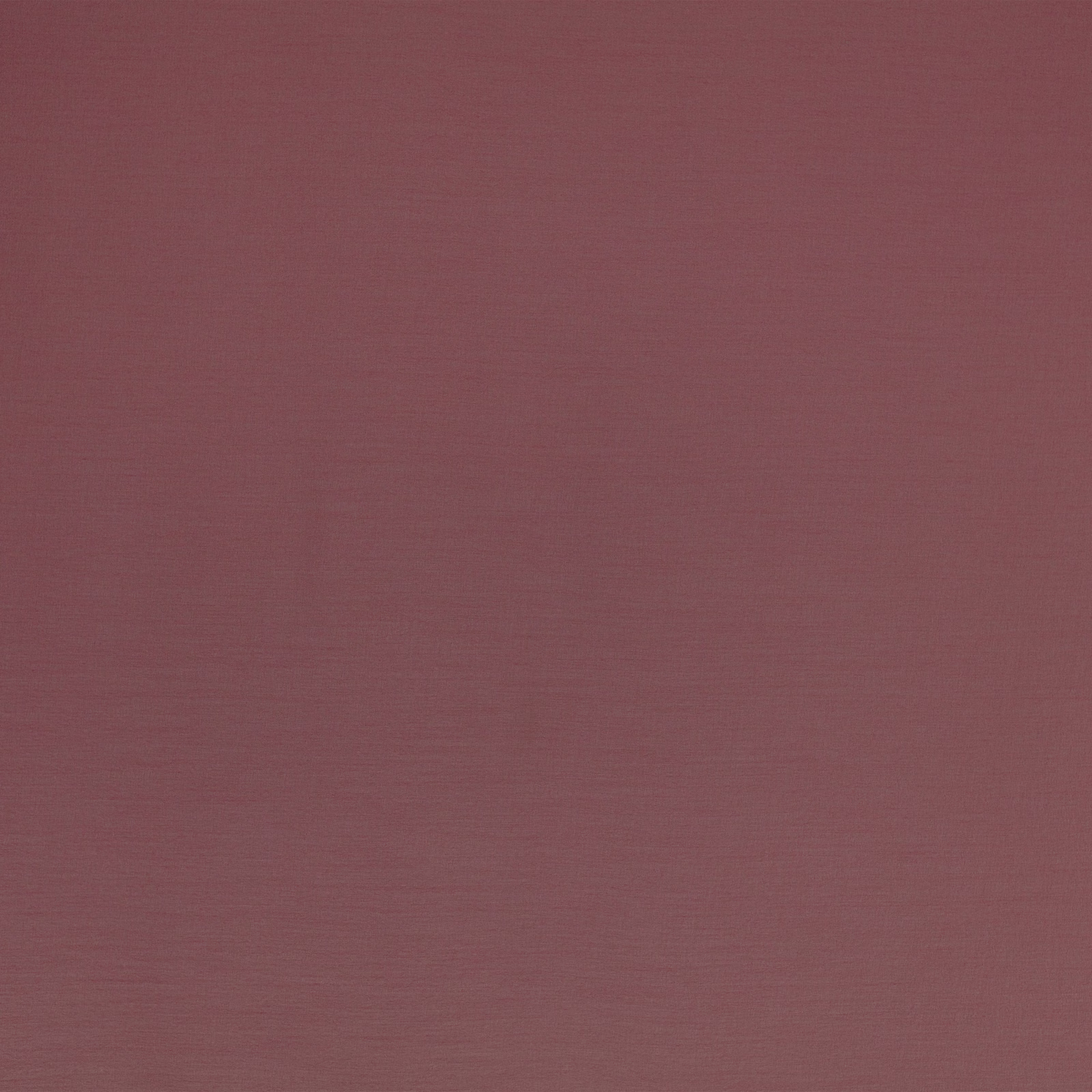 Muted plum plain-weave textile with subtle horizontal texture in close-up