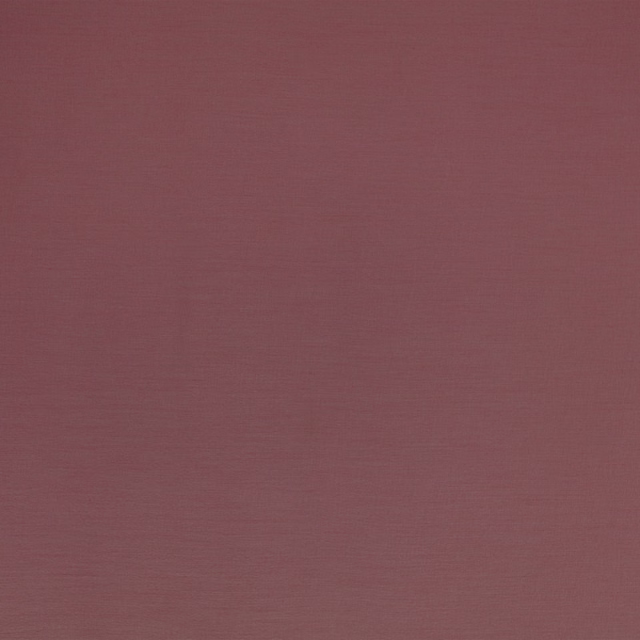 Muted plum plain-weave textile with subtle horizontal texture in close-up