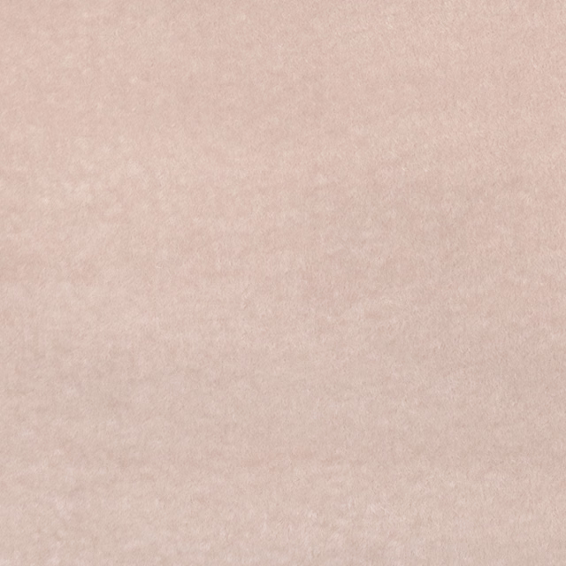Pale powder-pink fabric with a softly mottled, suede-like surface
