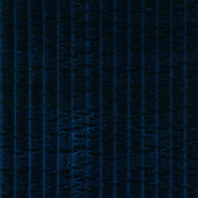Midnight navy jumbo cord fabric showing broad shaded vertical ribs and tactile texture
