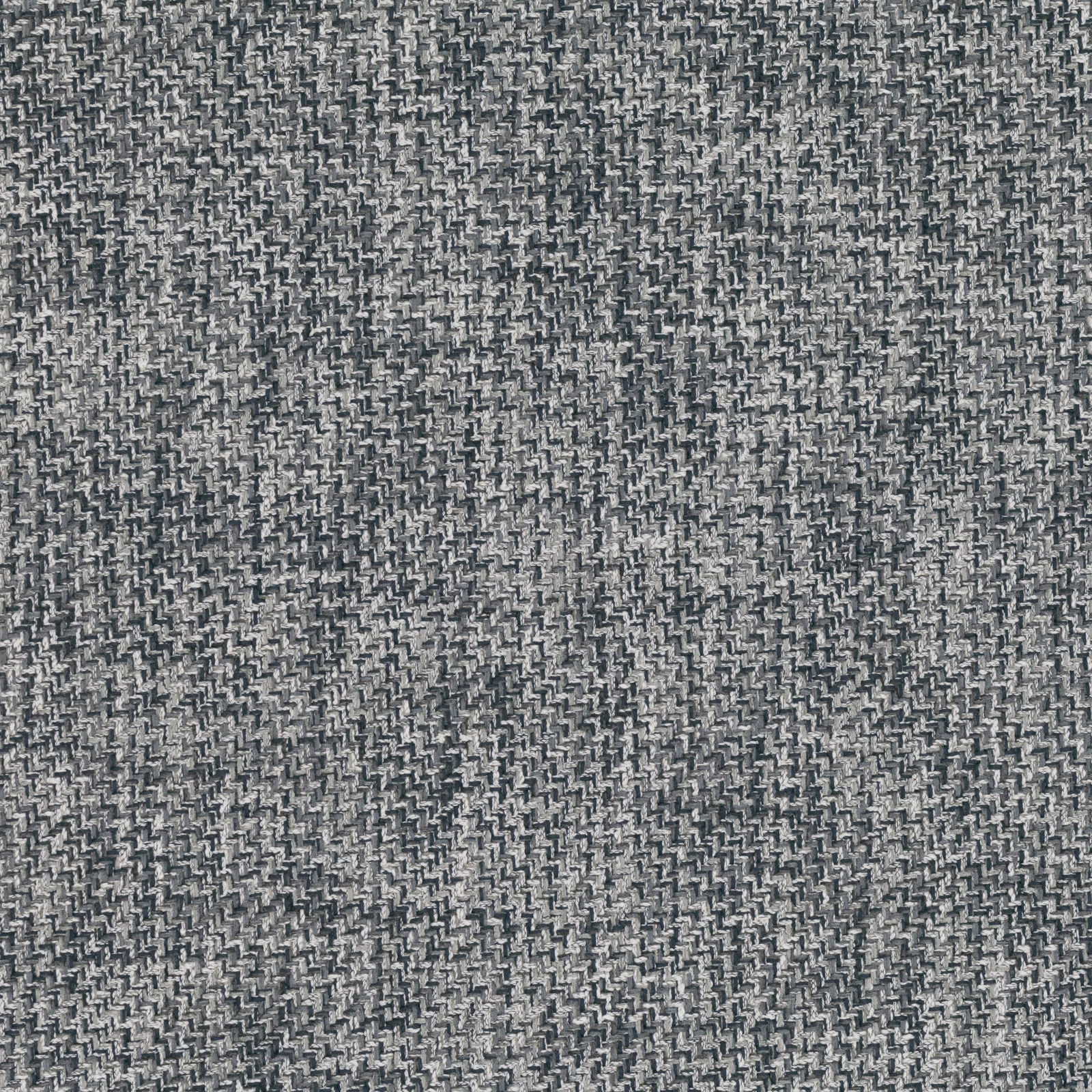 Graphite-grey woven textile with a dense broken chevron texture and softly flecked surface