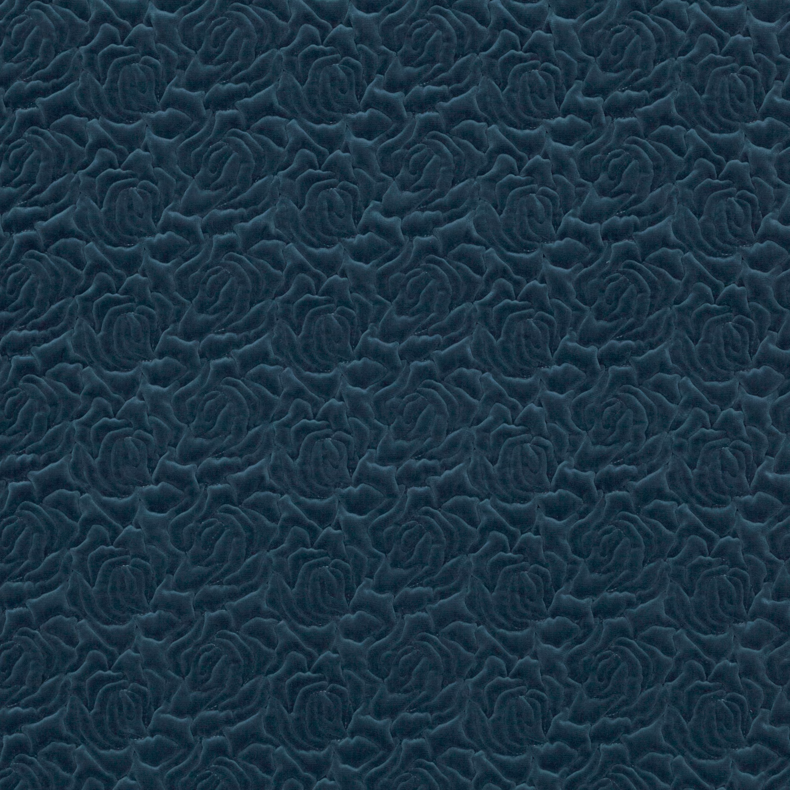 Deep indigo-blue fabric with raised, closely packed roses and soft tonal sheen