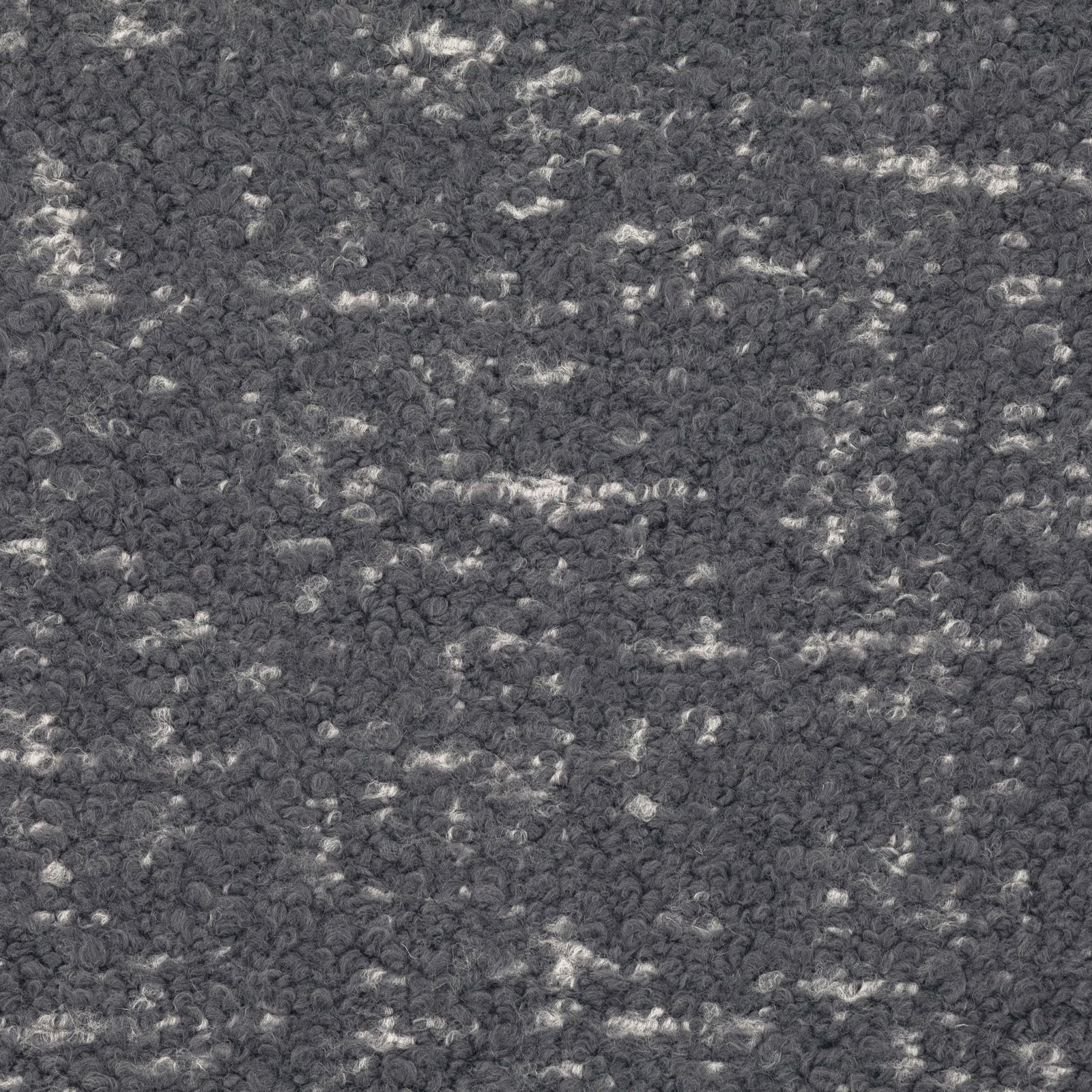 Cool slate-grey looped fabric with irregular pale flecks and a dense nubby texture