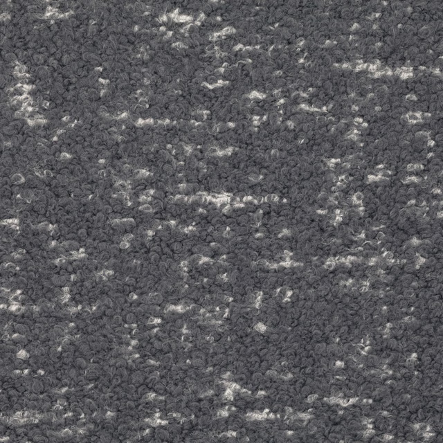 Cool slate-grey looped fabric with irregular pale flecks and a dense nubby texture