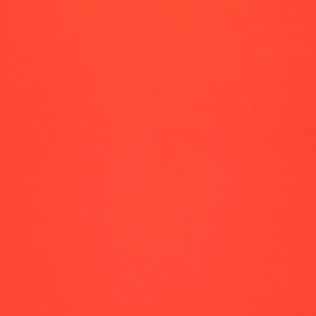 Vivid poppy red textile with a smooth, subtly textured plain surface