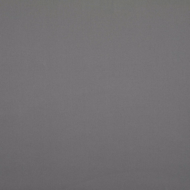 Close-up of cool graphite grey plain fabric with a soft, subtle woven texture