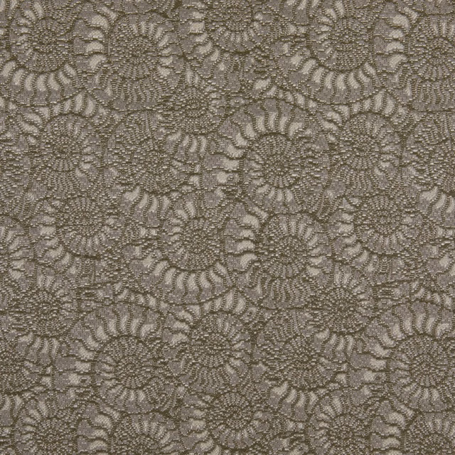 Muted khaki-taupe textile with densely packed scalloped floral rosettes and fine relief