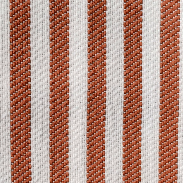 Close-up of terracotta and ivory vertical stripes with a ridged woven texture