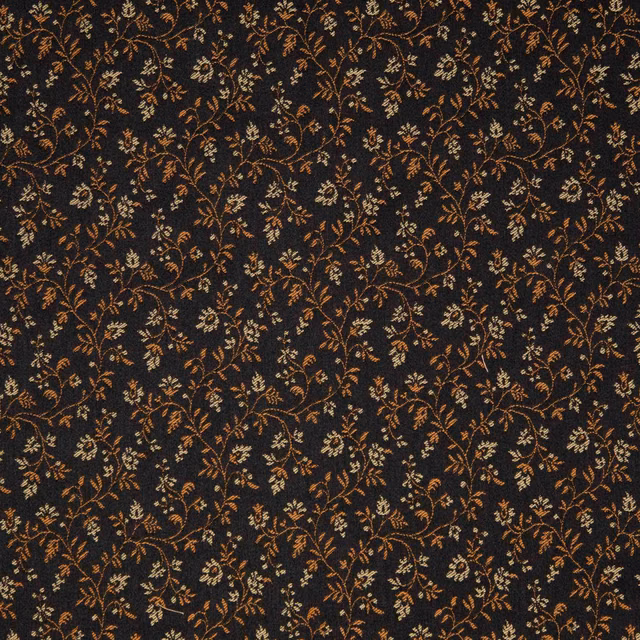 Near-black Brindille textile with dense rust, ochre and blue floral vines