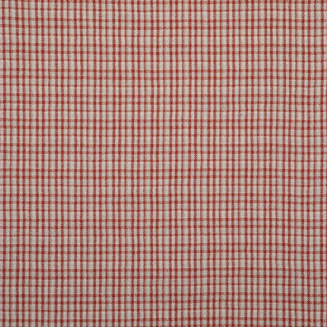 Muted cornaline-red and cream fine woven micro-check with subtle surface texture