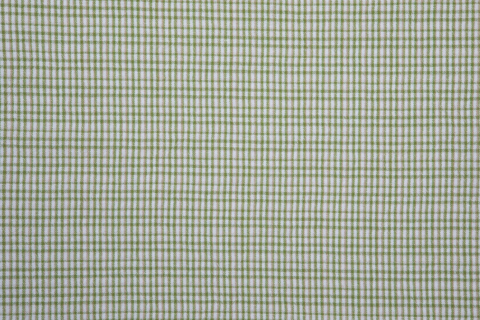 Fine cream fabric with a closely woven muted sage-green check pattern