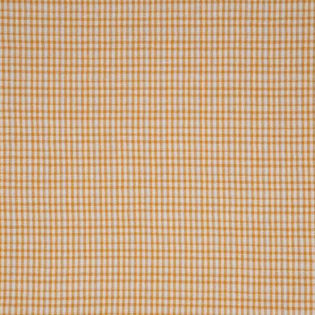 Warm ochre and cream small-check textile with a finely textured woven appearance