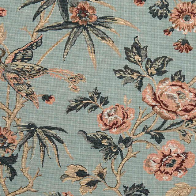Muted azure floral textile with birds, roses, branching stems and visible woven texture