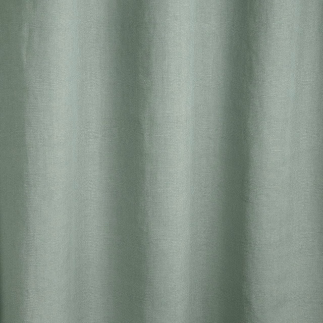 Muted agave-green fabric with fine vertical texture and softly shaded folds