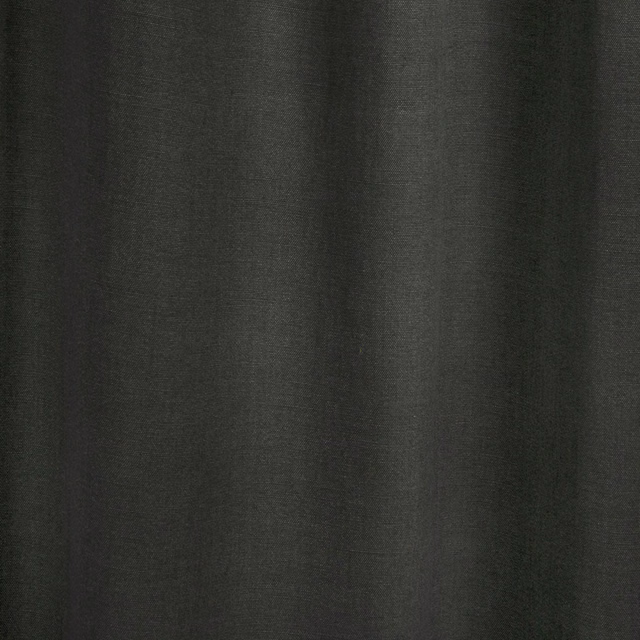 Deep anthracite-grey textile with fine vertical striations in softly falling folds