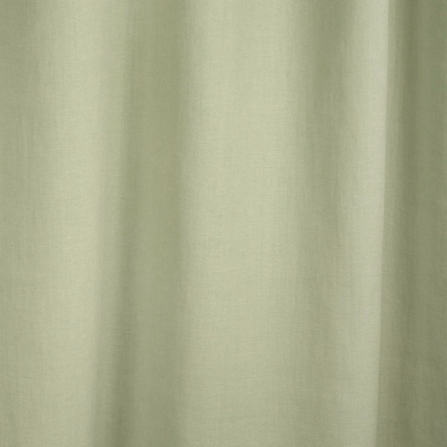 Pale celadon green plain-weave textile falling in soft vertical folds