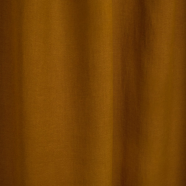 Warm curry-gold textile with fine vertical striations and deep gathered folds