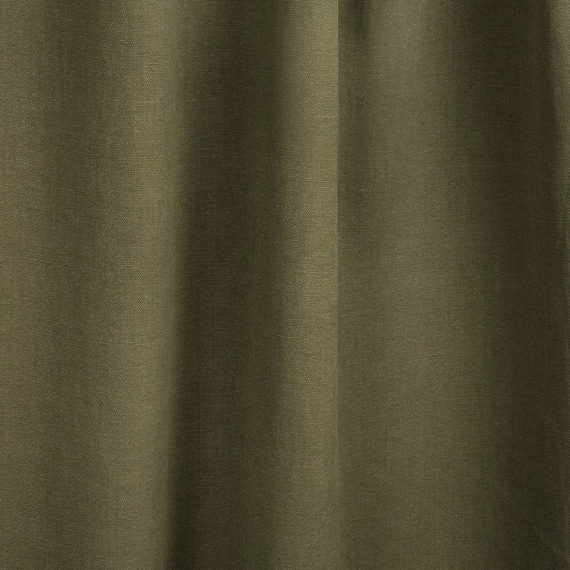 Muted khaki-olive Costa fabric hanging in soft vertical folds with a fine sheen