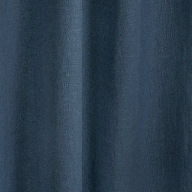 Deep ocean-blue plain fabric with fine vertical texture and softly folded drape