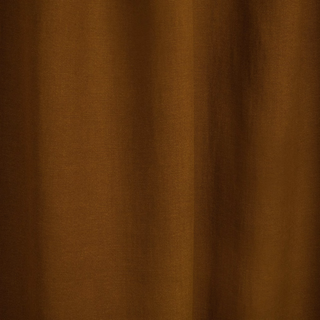 Deep ochre-brown textile with fine weave and softly shadowed vertical folds