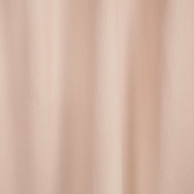 Pale poudre blush fabric with soft vertical texture and gentle folded shading