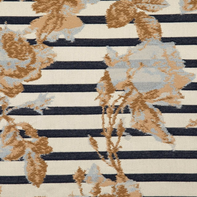 Ivory woven textile with navy stripes and tan, pale blue botanical forms