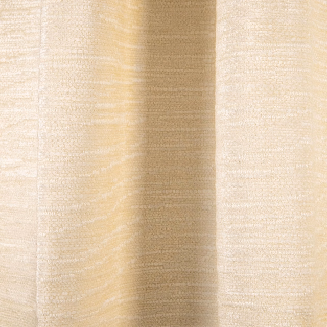 Warm ecru textile with fine horizontal slubs shown in deep vertical folds