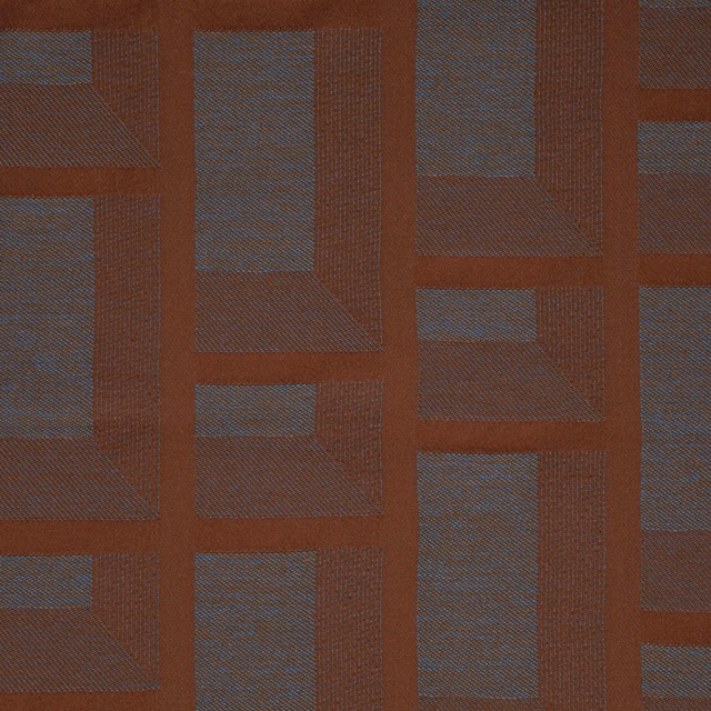 Muted terracotta woven fabric with blue-grey rectangular geometric blocks