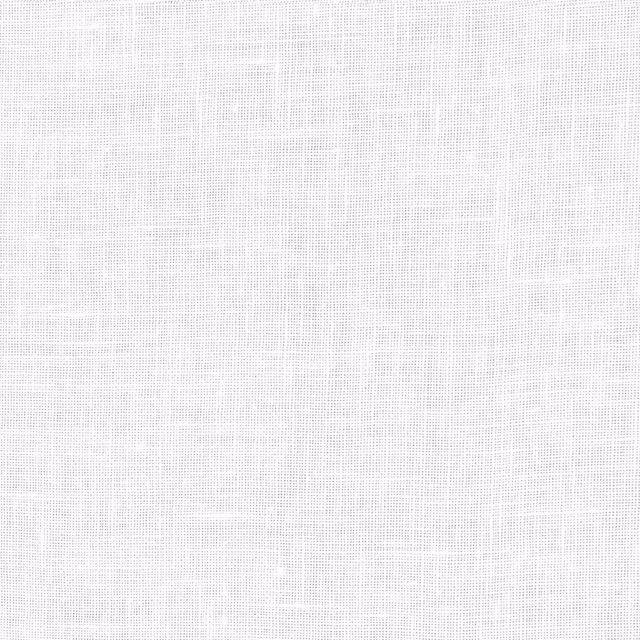 Soft white textile with fine irregular crosshatch weave and gently textured surface