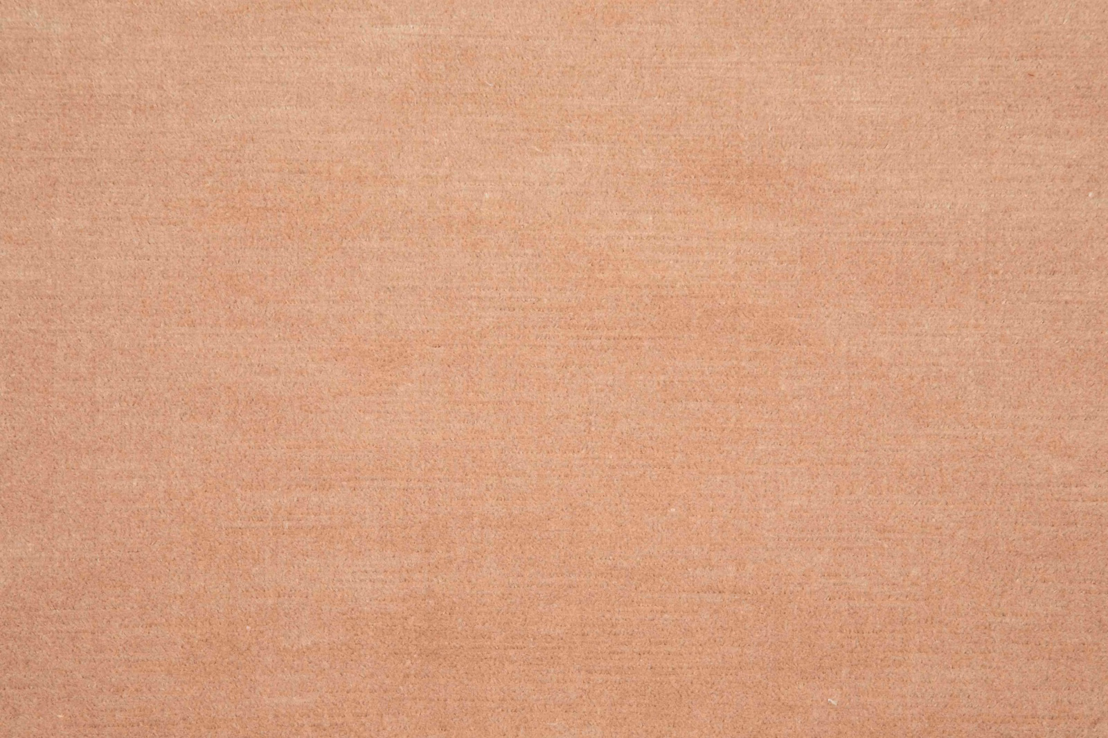 Muted dusty rose fabric with fine horizontal woven texture