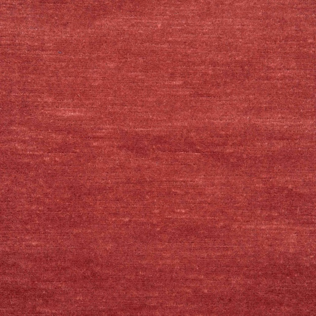 Garnet-red woven swatch with subtle horizontal slubs and softly varied tonal depth