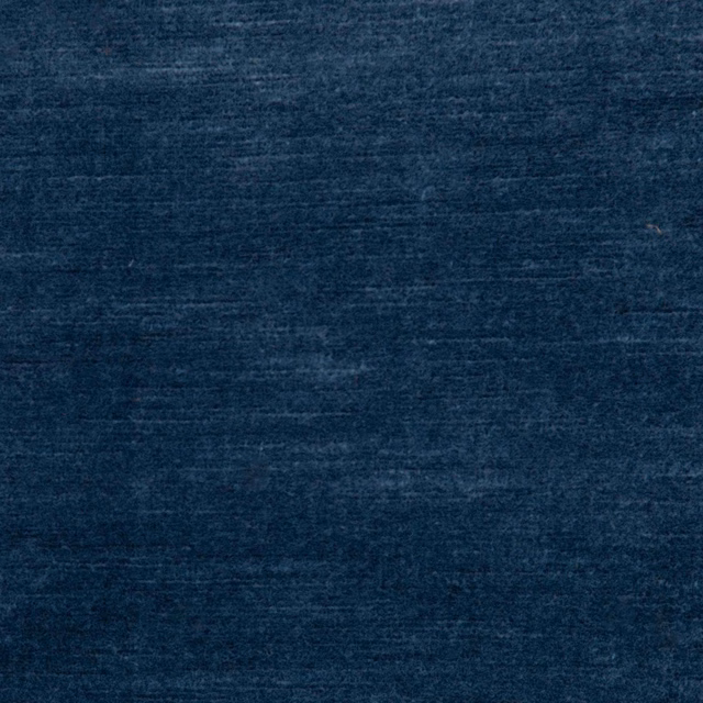 Deep ink-navy textile with subtle horizontal striations and softly varied surface