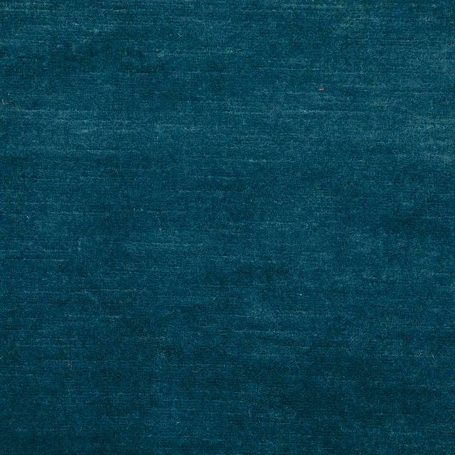Deep petrol-teal plain textile with softly brushed texture and subtle horizontal tonal streaks