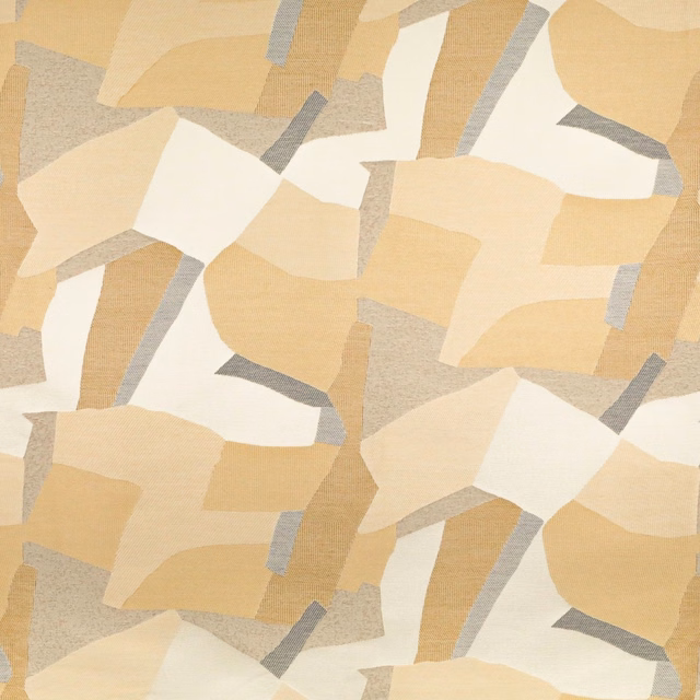 Warm sand, cream and pale grey angular patchwork on a softly textured textile swatch
