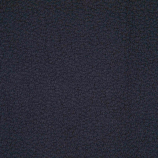 Close-up of Ideal Carbone showing a near-black charcoal, finely mottled textured weave
