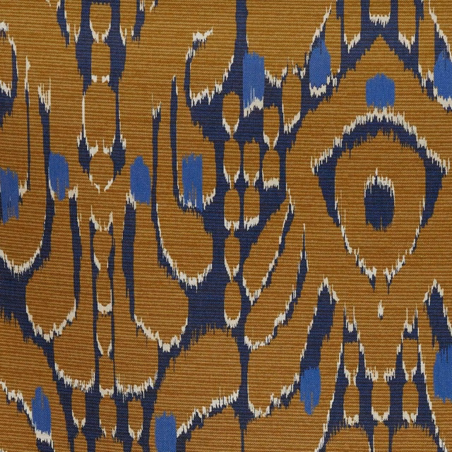 Camel ribbed fabric with bold ink-blue and ivory abstract ikat motifs