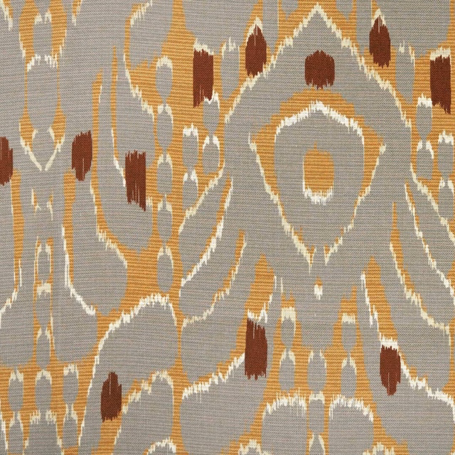 Tourterelle ikat textile with taupe-grey ground, ochre, rust and ivory motifs